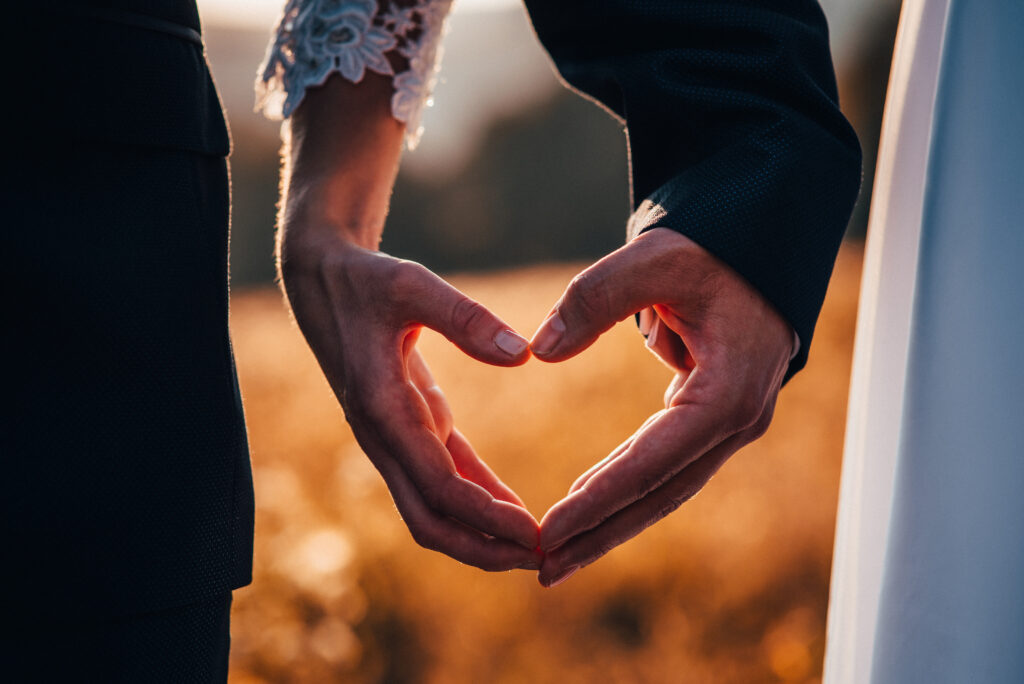 Hands of man and woman in shape of heart, wedding, valentine, love photo