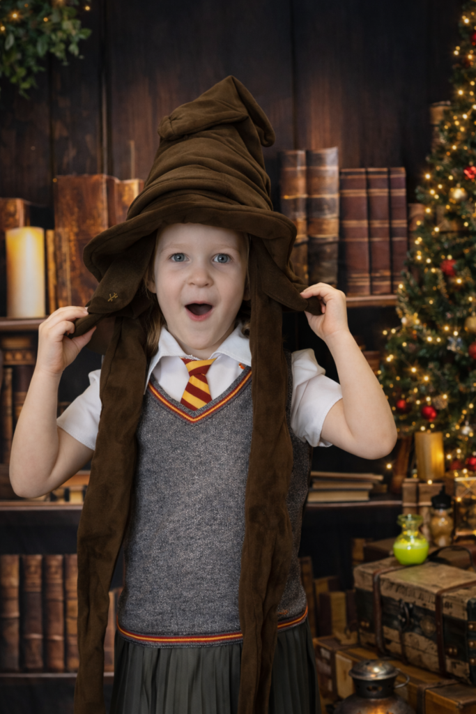 Little Witch & Sorting Hat - Dumbledore's Library - Wizarding World Holiday Experience -Jennifer Mummert Photography