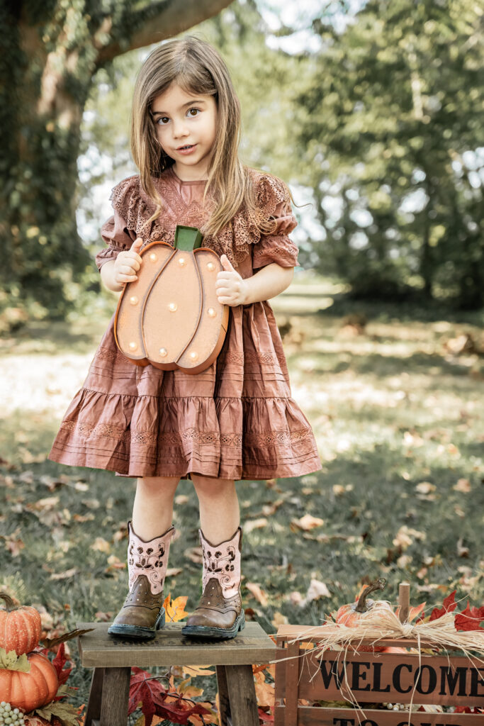 A glimpse into Ms. Evelyn's enchanting fall mini session at Greenwell State Park, beautifully captured by Jennifer Mummert.