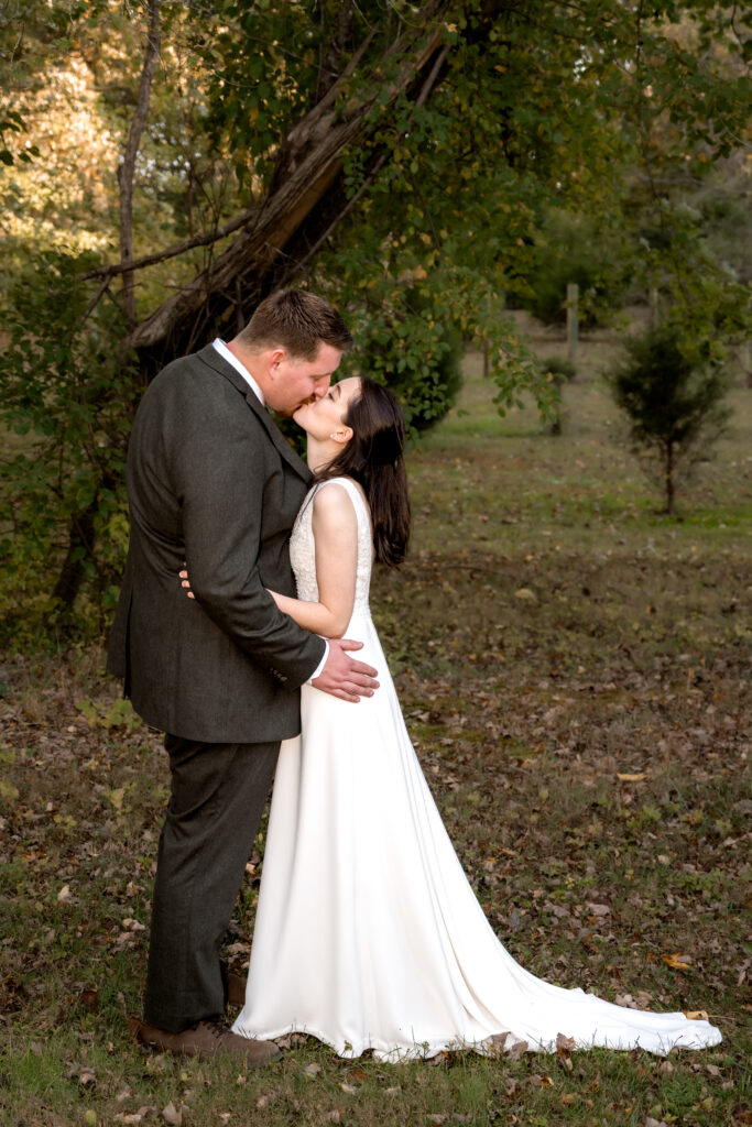 Bride & Groom Kissing Beneath a Tree - Bridal Portraits - Wedding Timeline Blog Post