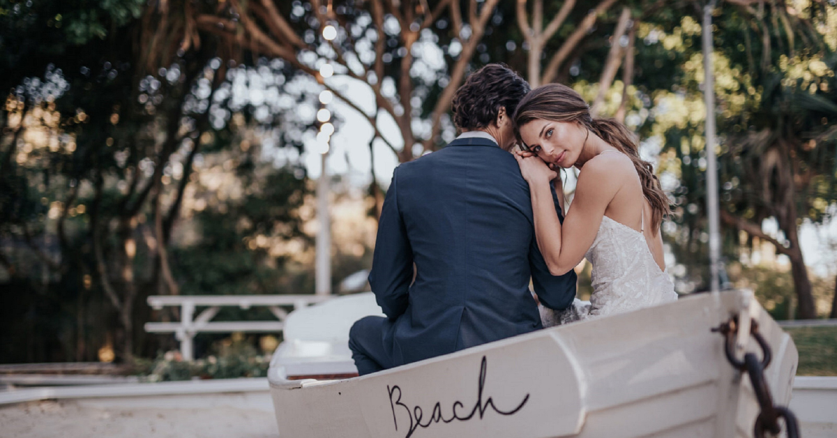 Couple floating in the water during their Florida Beach adventure elopement in with Jennifer Mummert Photography Reason to Elope- Less Stress More Love